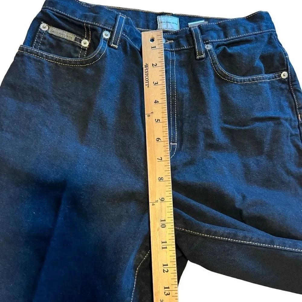 Calvin Klein Black Five Pocket Jeans. Size 6. 32 inch inseam. Great Condition!!
